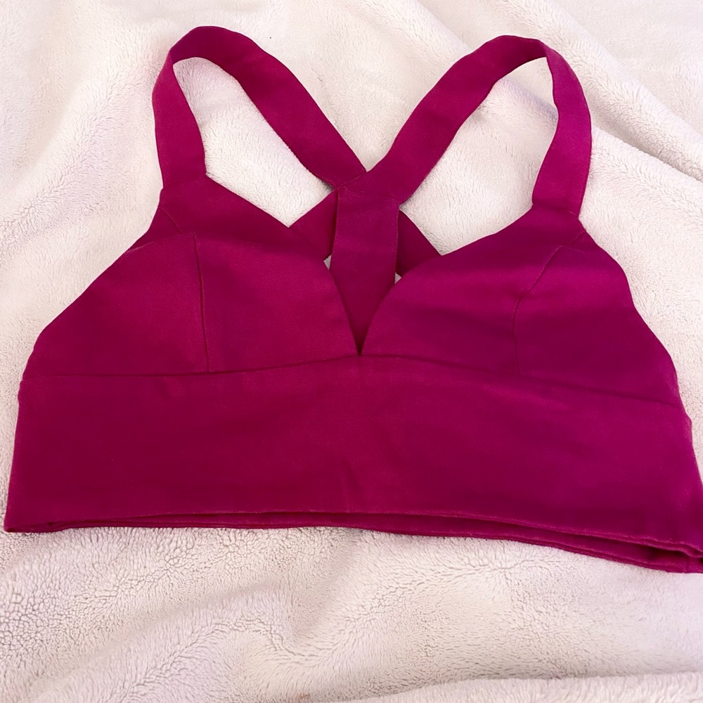 Signature8 raspberry color bralette size Large with strap detail on back.